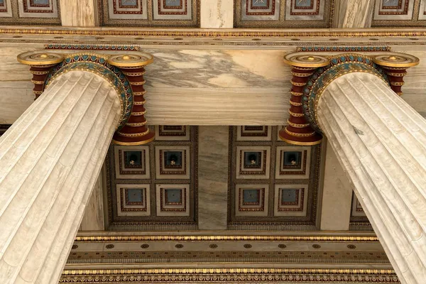 Classical Greek architecture columns with ornate capitals