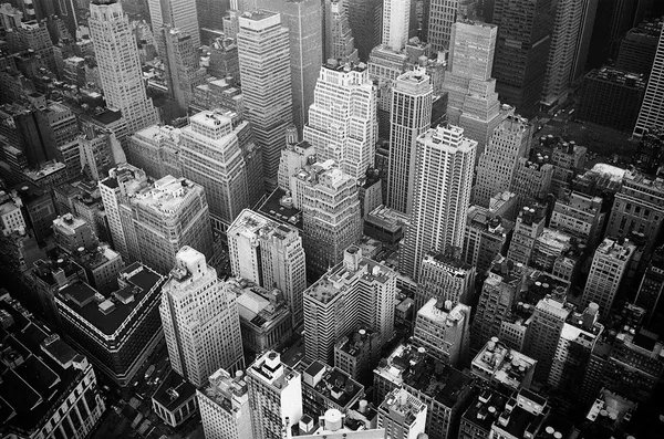 Aerial black and white view of city buildings